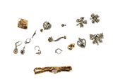 an image of a collection of jewelry on a white surface