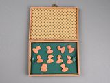a wooden box with several pieces of paper in it