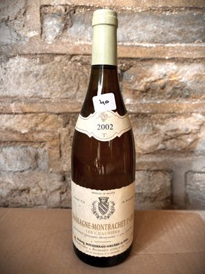 a bottle of wine that is sitting on a table