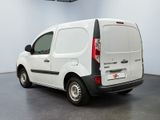 a white van that is parked in a room