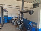 an image of a garage with a lot of tools in it