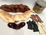 some gloves, gloves, gloves, and a can of coffee on a table