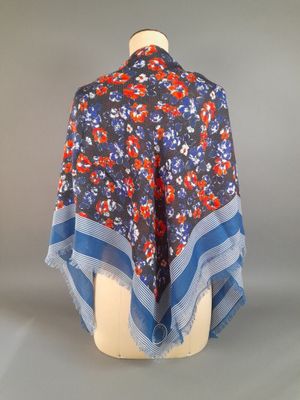 an image of a blue and red scarf on a mannequin dummy