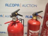 two fire extinguisors sitting next to each other