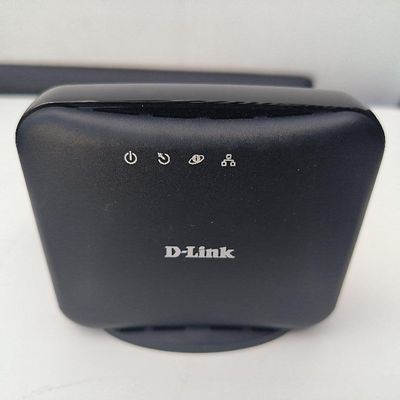 une photo d'un routeur D-Link posé sur une table