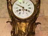 a clock that is on the wall of a building