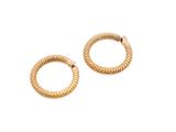 a pair of gold hoop earrings on a white background