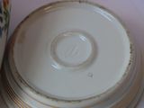 a close up of a plate and a cup on a table
