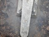 a close up of a metal object on a table