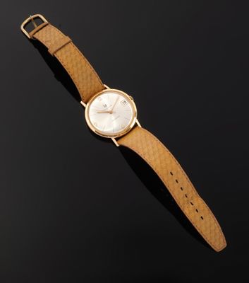 a gold wrist watch with a white dial and brown leather strap
