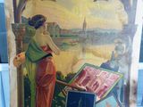 une vieille affiche représentant une femme debout à côté d'une valise