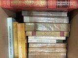 a box full of books that are sitting on a table