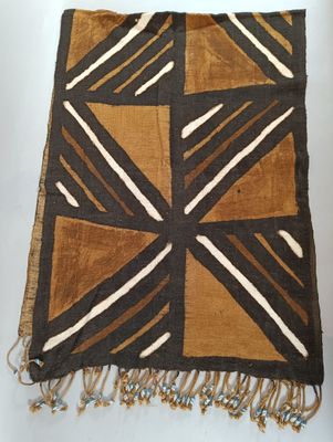 une image représentant un tissu marron et blanc orné d'un motif