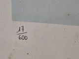 a picture of a white microwave with a number on it
