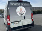 a van that is parked in a parking lot