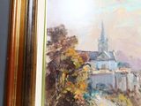 a picture of a painting of a church on a hill