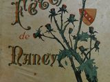 un livre sur lequel figurent l'image d'une plante et celle d'un masque