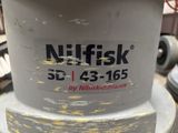 a close up of a nutfisk machine with a sticker on it