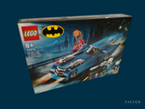 lego batman batmobile set in its box on a blue background
