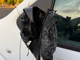 a car that has been damaged by the windscreen