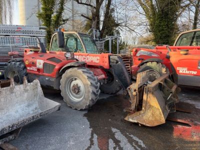 Charriot télescopique MANITOU type MT 702 équipé fourche et godet - He