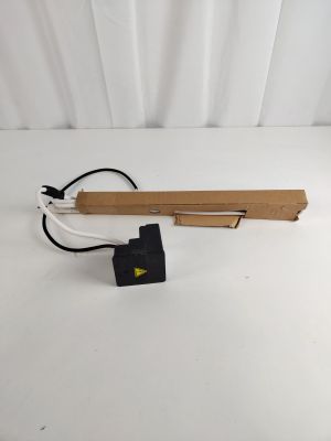 an electric device with a cord connected to it on a white surface