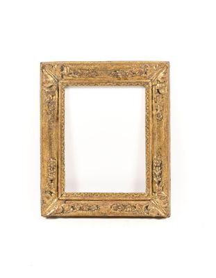 an antique gold frame with a white background