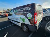 a van that is parked in a parking lot