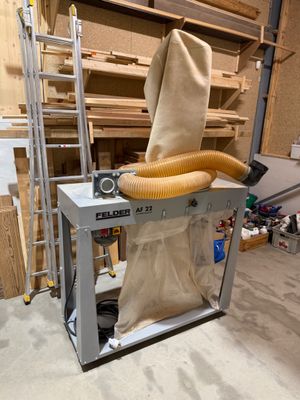 an image of a dust collector in a garage