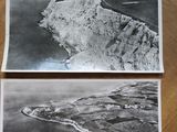 two old black and white photos of an island in the ocean