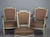 lot de quatre fauteuils de style Louis XVI