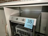 a dishwasher that has a price tag on it