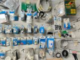a wall with many different types of electrical equipment on it