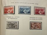 an open book with a bunch of different stamps on it