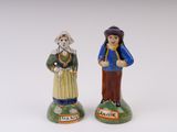 pair of ceramic figurines of a man and a woman