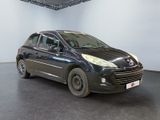 a picture of a black car parked in a showroom