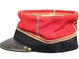 a red and black hat on a white background