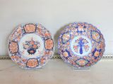 two plates that are sitting next to each other on a table