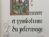 an old book with a picture of a man holding a staff