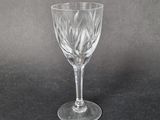 a close up of a wine glass on a table