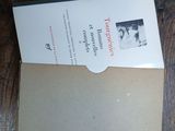 an envelope with a picture on it on a wooden table