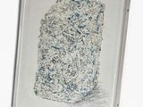 a drawing of a rock on a white surface