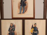three framed pictures of men in military uniforms on a wall
