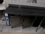 a picture of a kitchen with a sink and a microwave