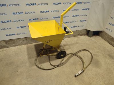 an image of a yellow cart with a hose attached to it