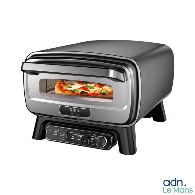 une photo d'un four grille-pain contenant une pizza