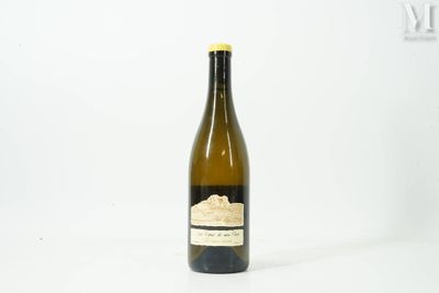 a bottle of wine that is sitting on a table