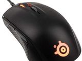 a close up of a mouse on a white surface
