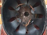 a helmet that has a hole in the middle of it
