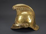 an image of a gold helmet on a black background